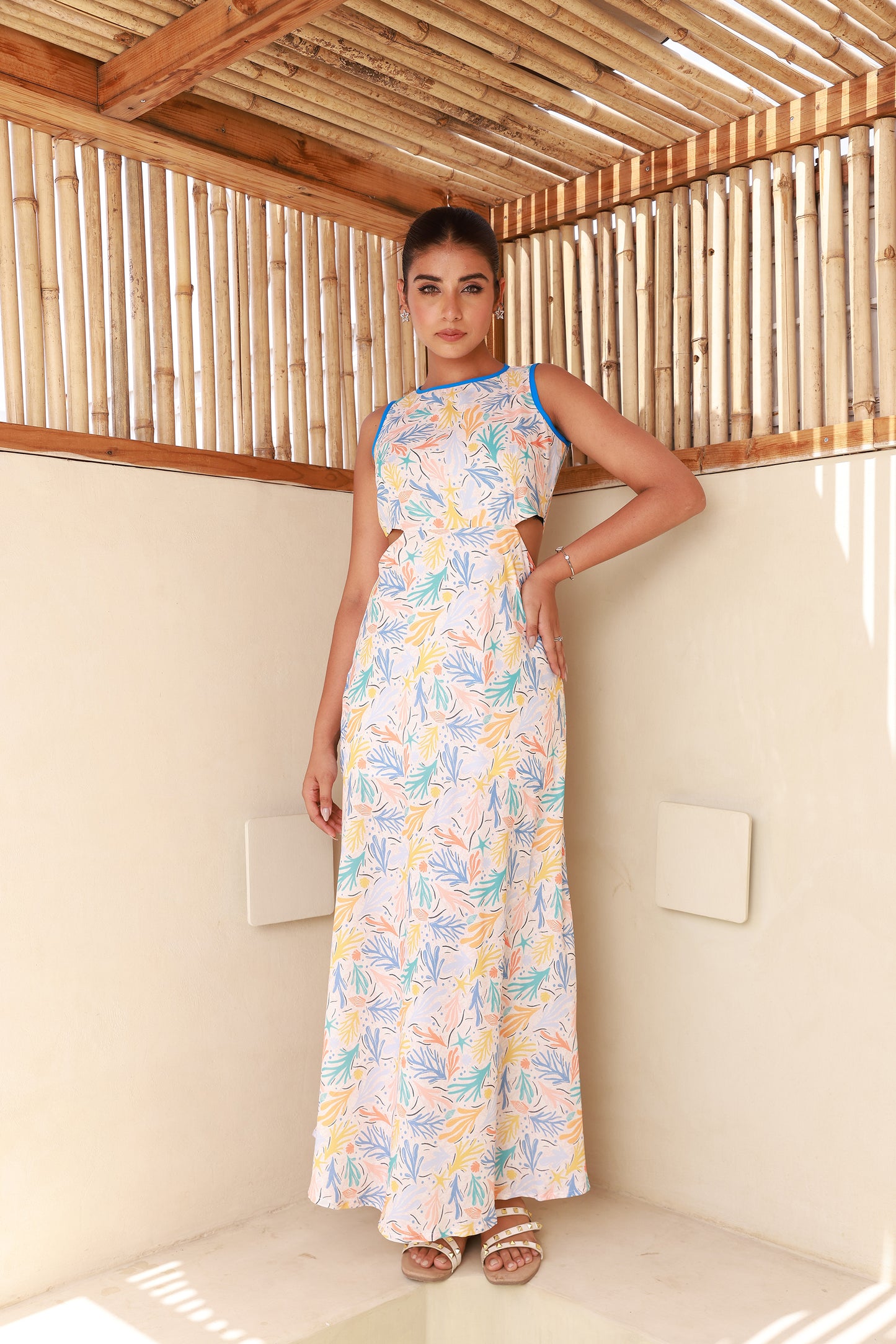 Printed Sleeveless Straight Maxi Dress with Side Waist Cut-Out Moonstruck Printed Sleeveless Straight Maxi Dress with Side Waist Cut-Out Moonstruck