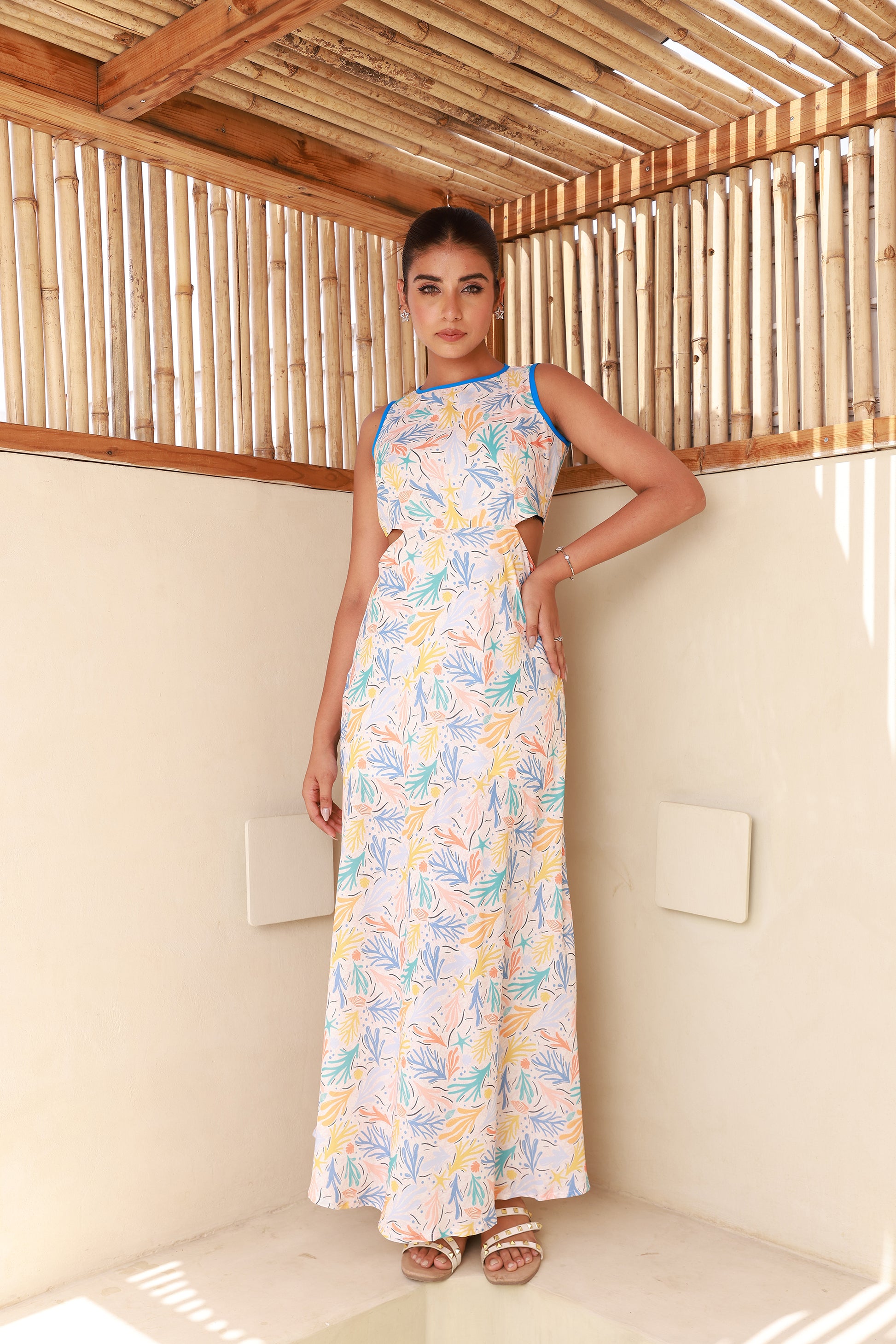 Printed Sleeveless Straight Maxi Dress with Side Waist Cut-Out Moonstruck Printed Sleeveless Straight Maxi Dress with Side Waist Cut-Out Moonstruck