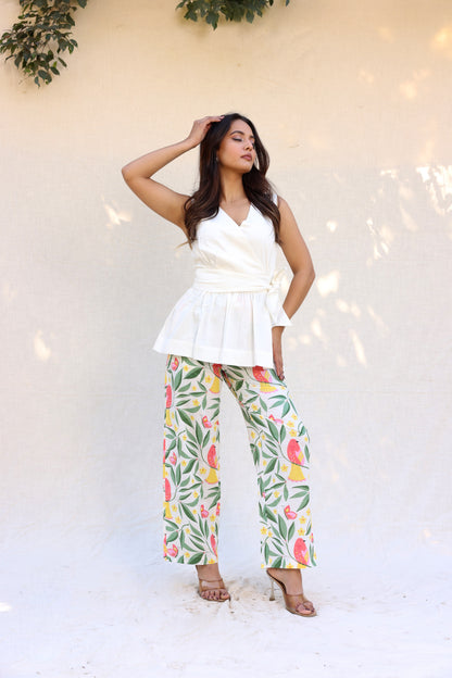 Sleeveless peplum top with tie knot belt with printed pants set