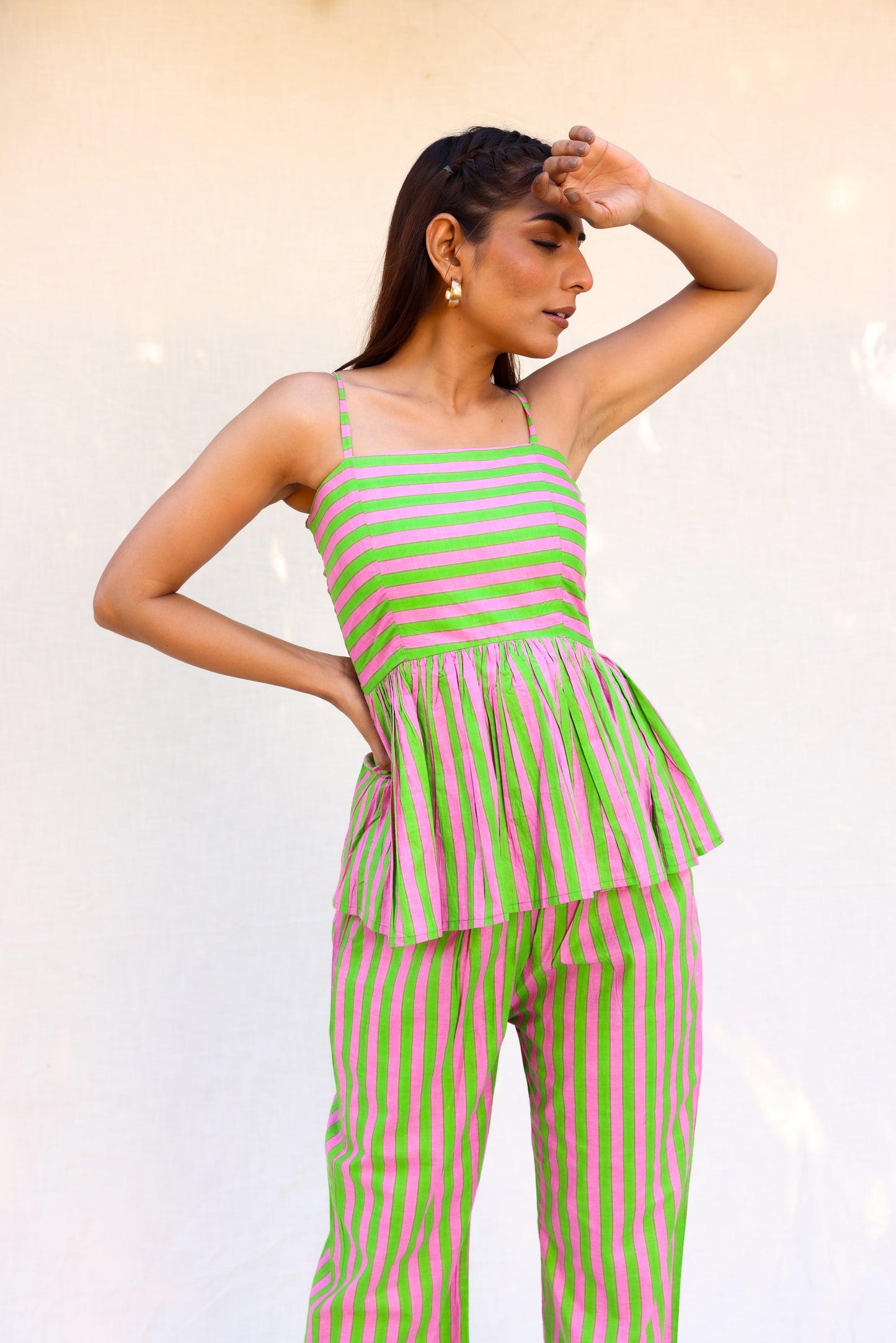Contrast stripped strappy peplum top with straight pants set