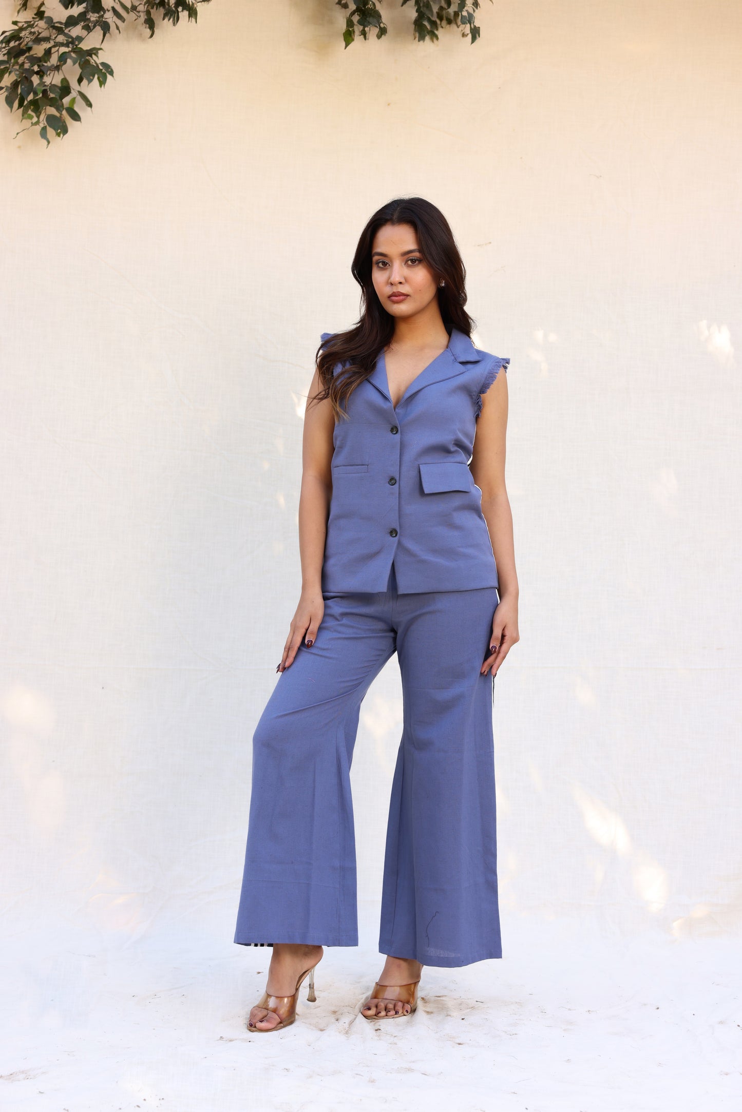 Sleeveless blazer with pants stripped on sides set