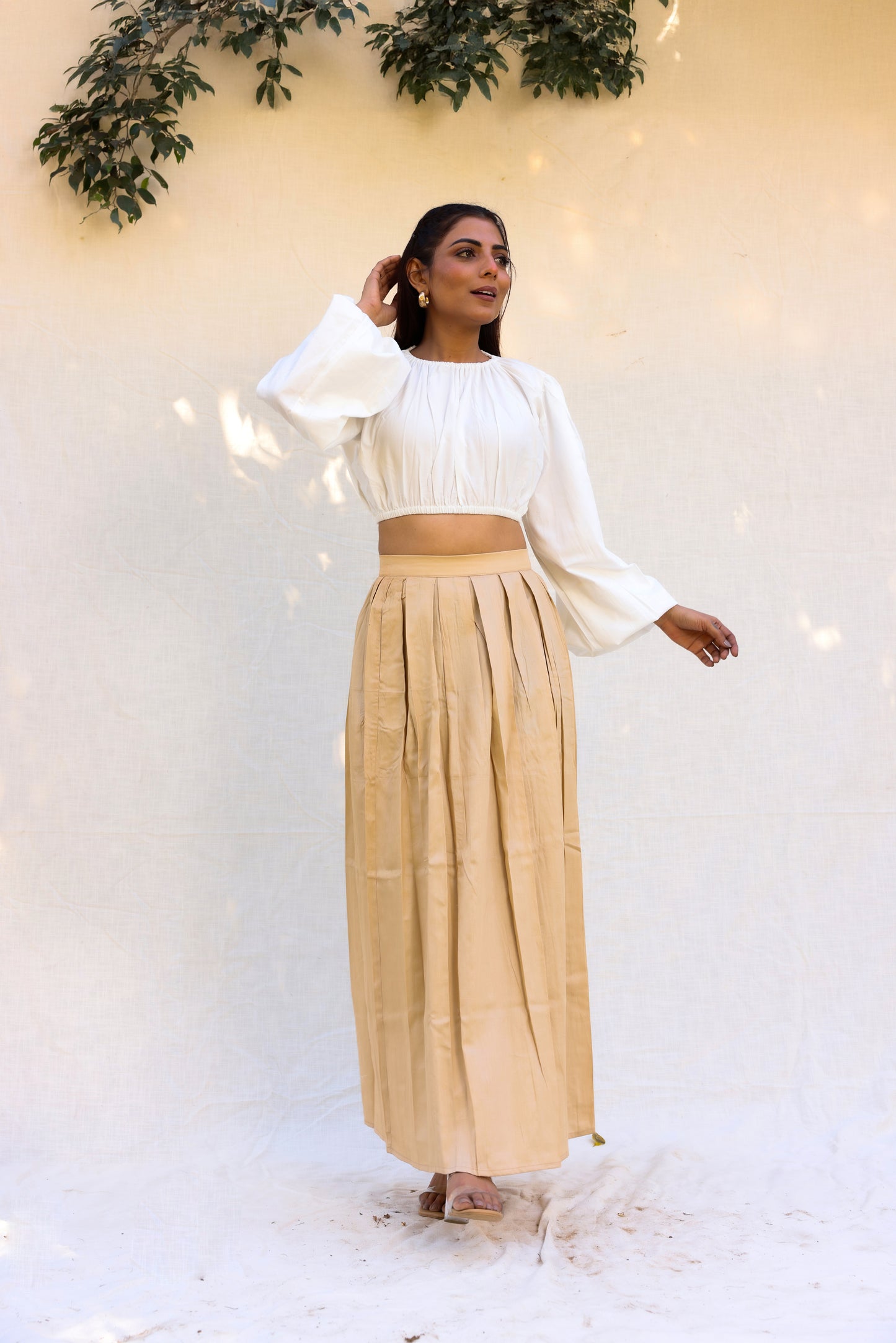 Off white top with beige skirt set