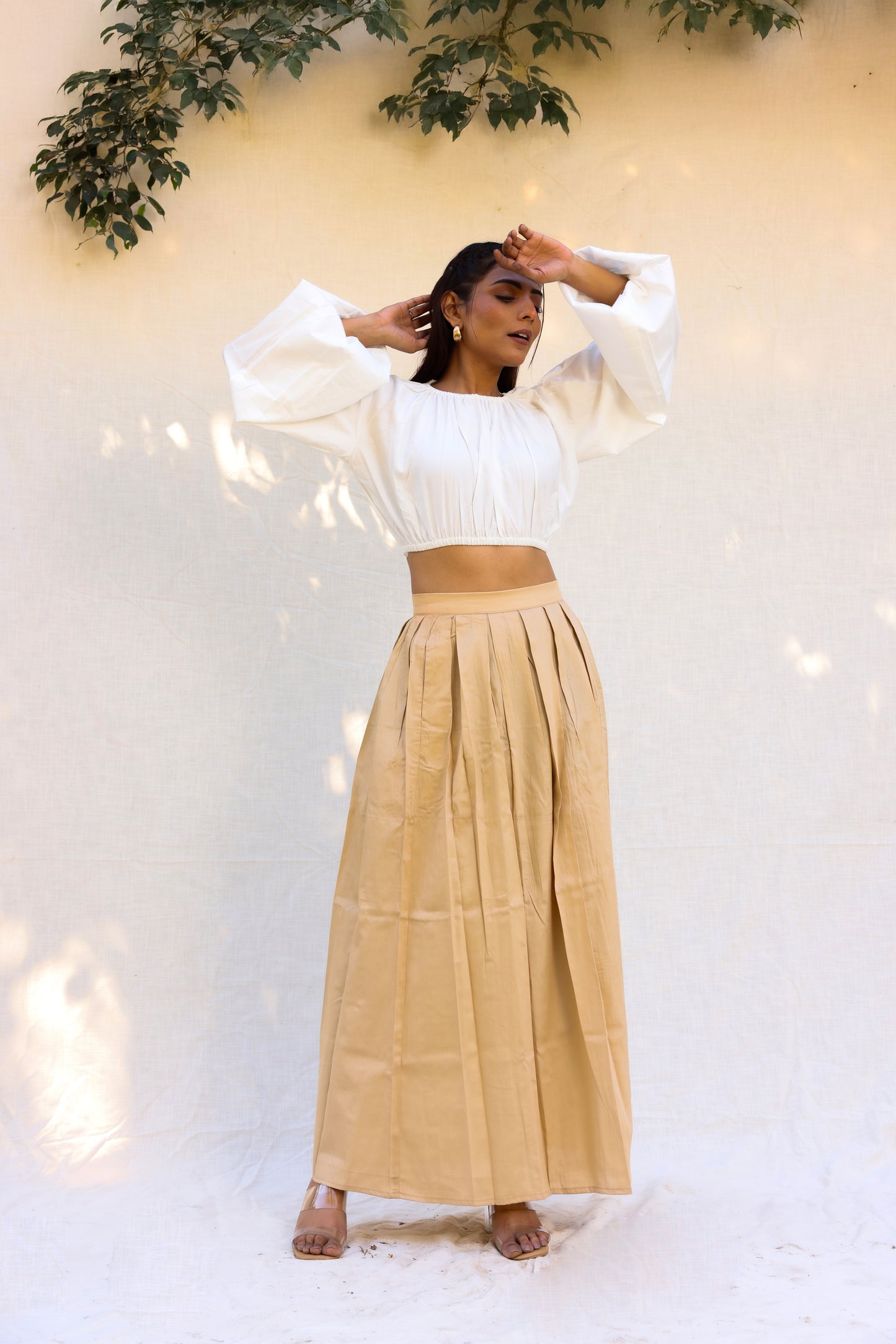 Off white top with beige skirt set