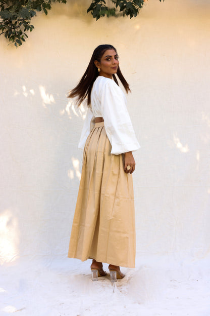 Off white top with beige skirt set