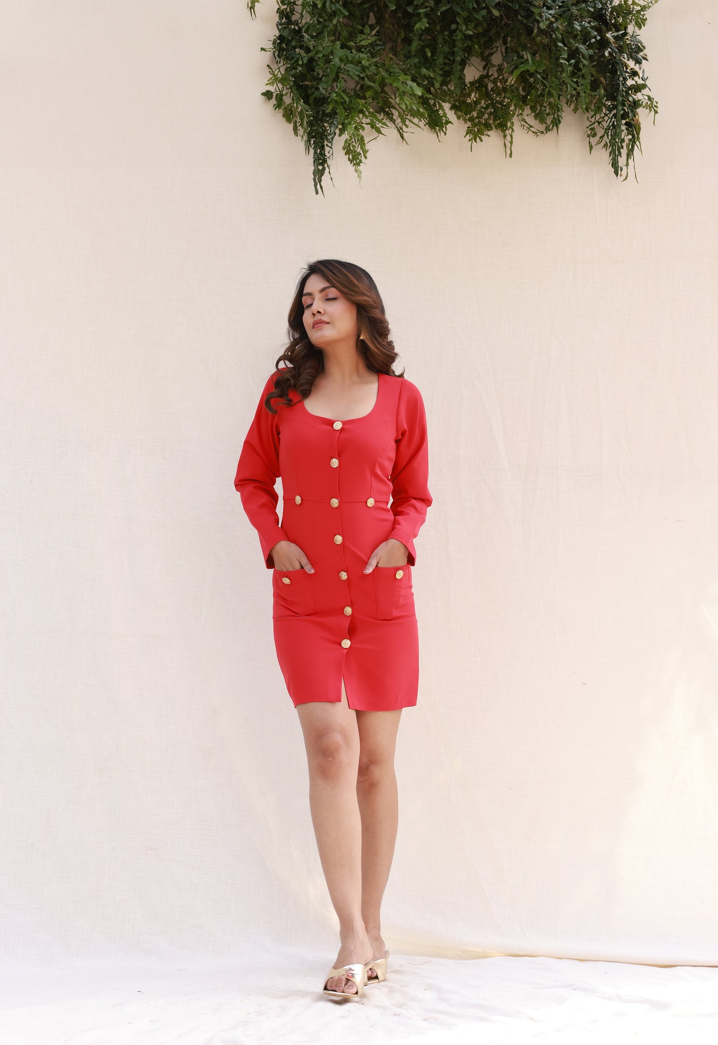 Red bodycon dress with gold buttons