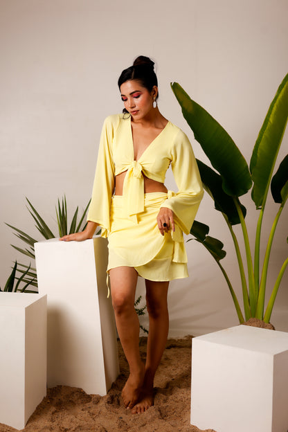 Deep V-neck yellow tie knot crop top with sarong skirt set