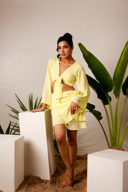 Deep V-neck yellow tie knot crop top with sarong skirt set