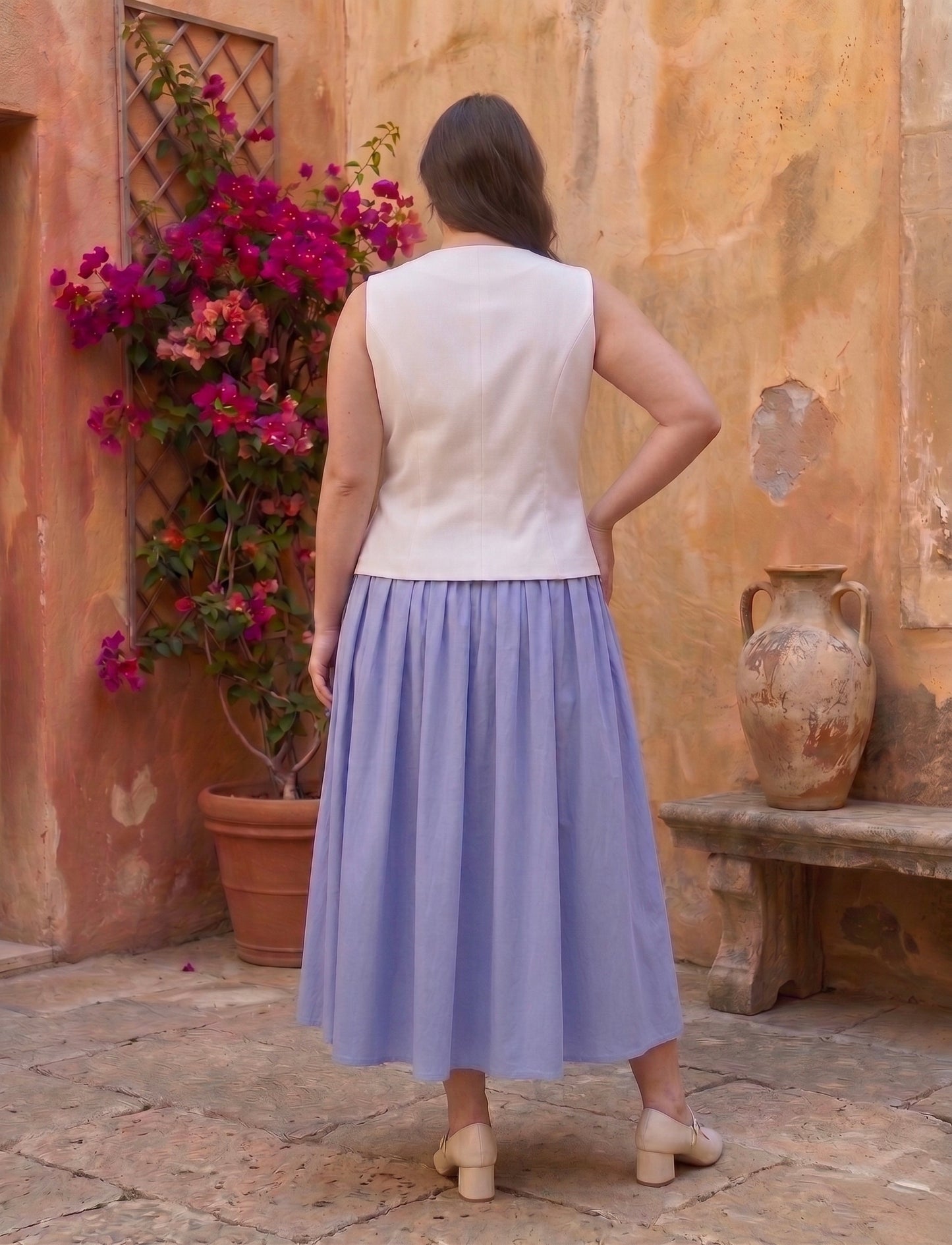 Graceful White Sleeveless Vest with Light Blue Midi Skirt Moonstruck